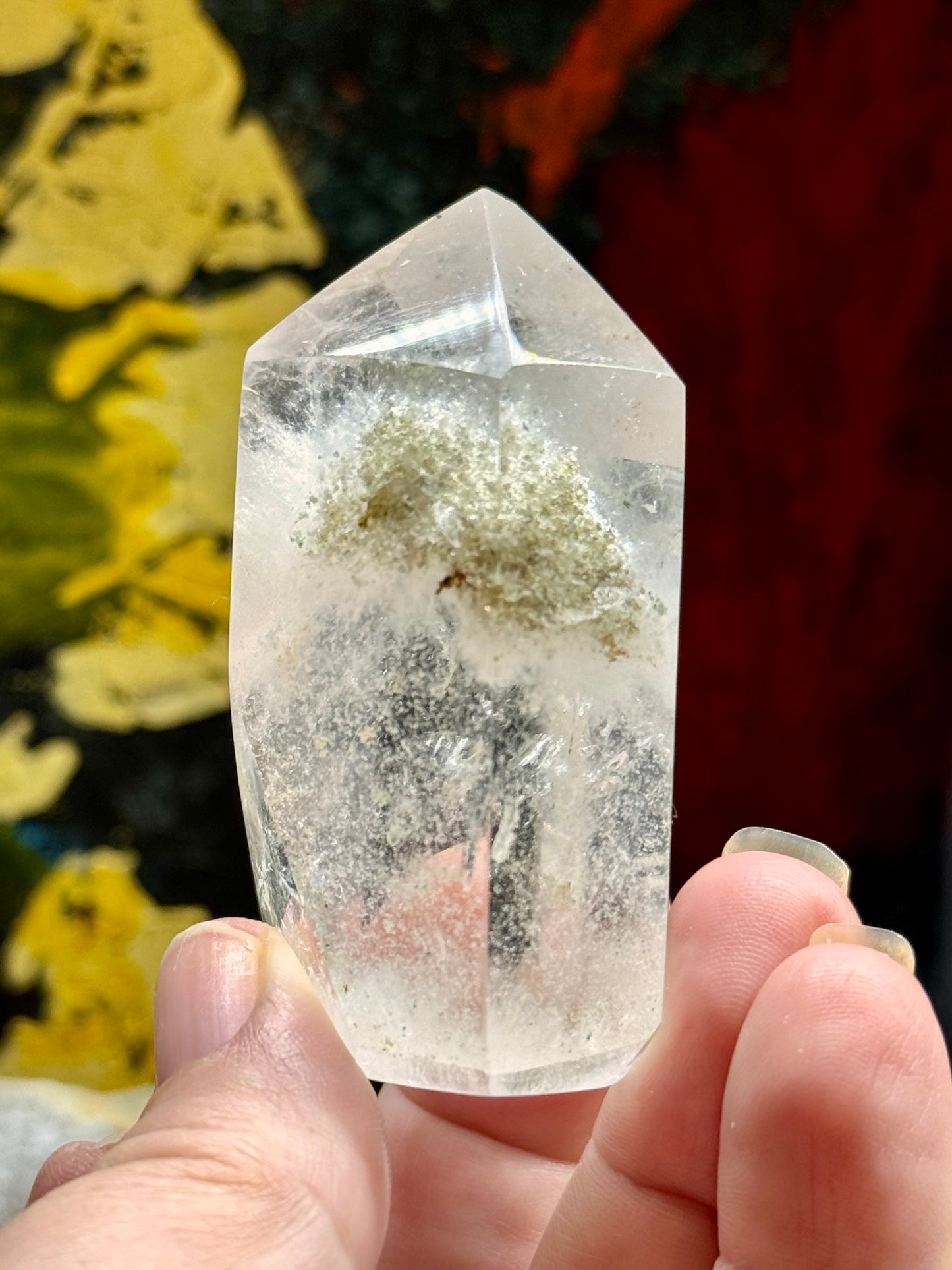 Pointe de quartz blanc avec inclusions