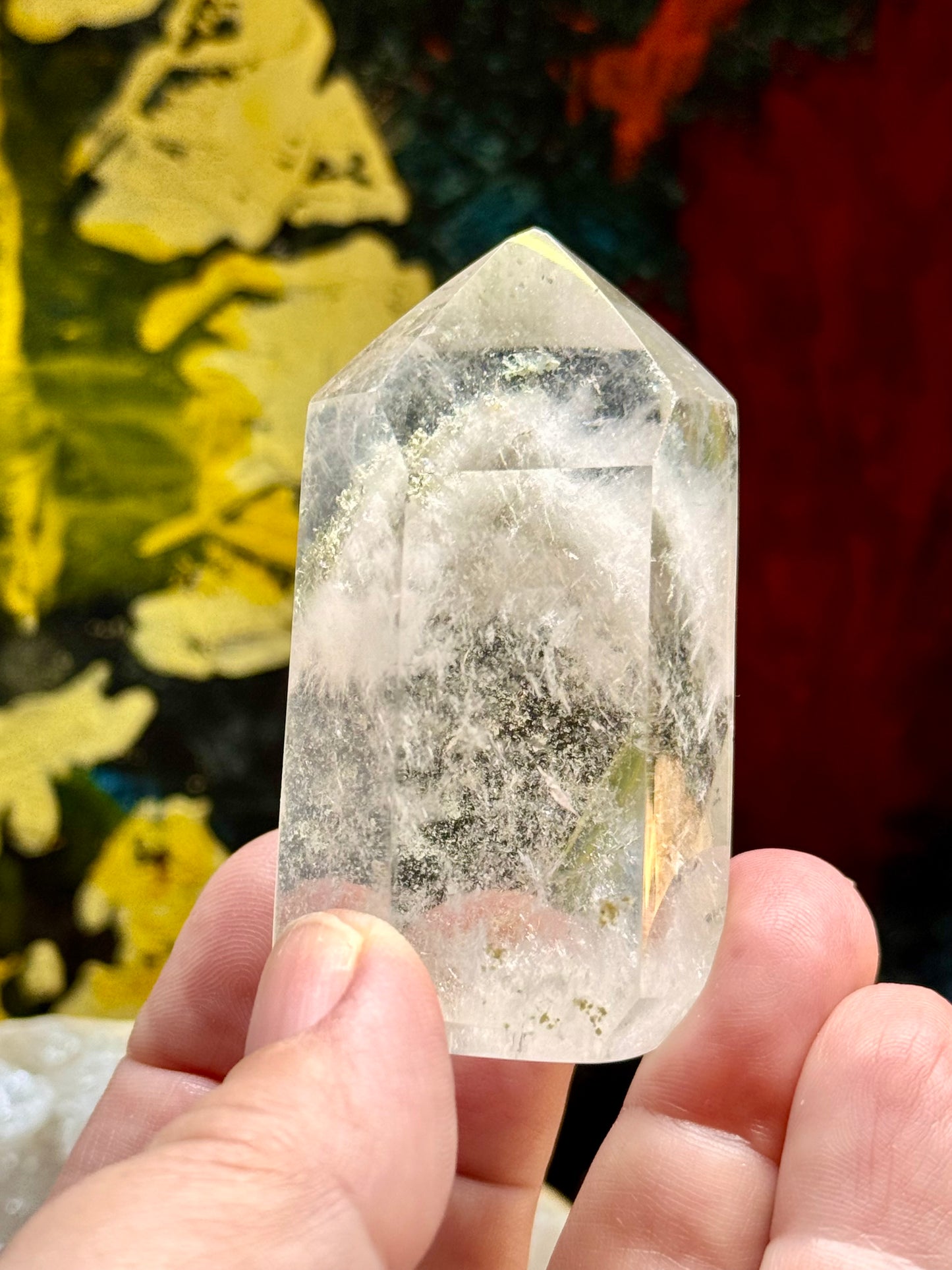 Pointe de quartz blanc avec inclusions